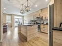 1-75 Aquitania Circle West, Lethbridge, AB  - Indoor Photo Showing Kitchen With Stainless Steel Kitchen With Upgraded Kitchen 