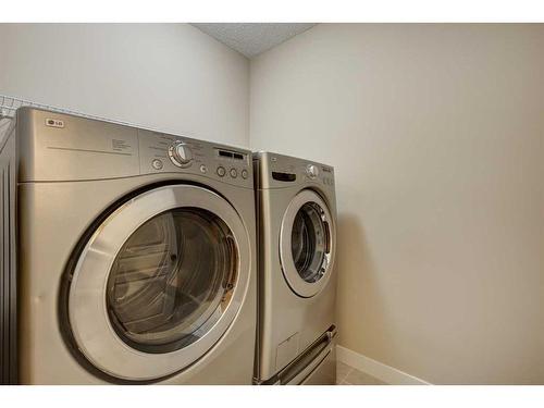 75 Cranleigh Heath Se, Calgary, AB - Indoor Photo Showing Laundry Room