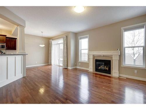 75 Cranleigh Heath Se, Calgary, AB - Indoor Photo Showing Living Room With Fireplace