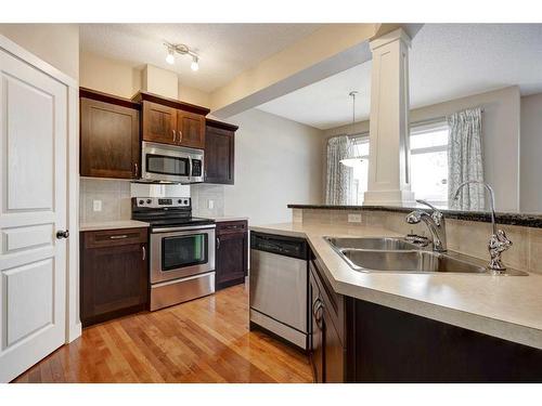 75 Cranleigh Heath Se, Calgary, AB - Indoor Photo Showing Kitchen With Double Sink