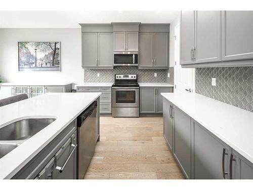 24 Carrington Rise Nw, Calgary, AB - Indoor Photo Showing Kitchen