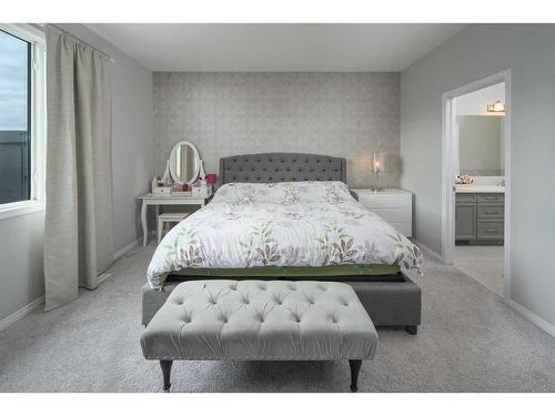 24 Carrington Rise Nw, Calgary, AB - Indoor Photo Showing Bedroom