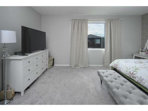 24 Carrington Rise Nw, Calgary, AB - Indoor Photo Showing Bedroom