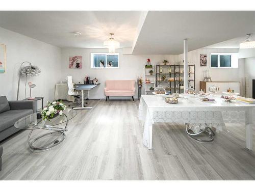 24 Carrington Rise Nw, Calgary, AB - Indoor Photo Showing Living Room