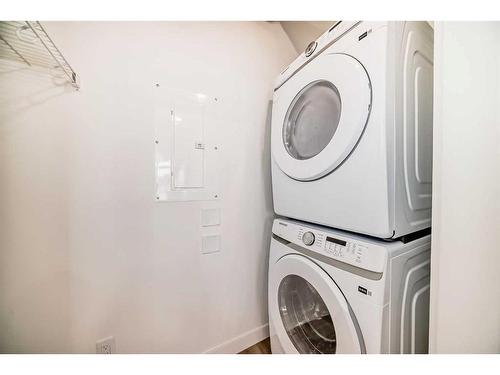 204-60 Sage Hill Walk Nw, Calgary, AB - Indoor Photo Showing Laundry Room