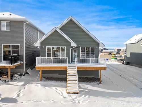 483 Rivercrest Road West, Cochrane, AB - Outdoor With Deck Patio Veranda