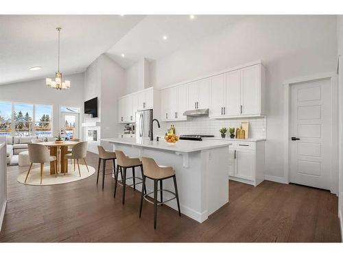 483 Rivercrest Road West, Cochrane, AB - Indoor Photo Showing Kitchen With Upgraded Kitchen