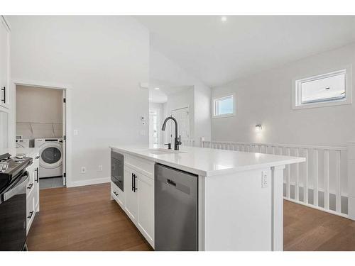 483 Rivercrest Road West, Cochrane, AB - Indoor Photo Showing Kitchen