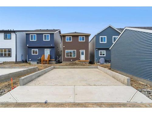 938 Cobblemore Common Sw, Airdrie, AB - Outdoor With Facade