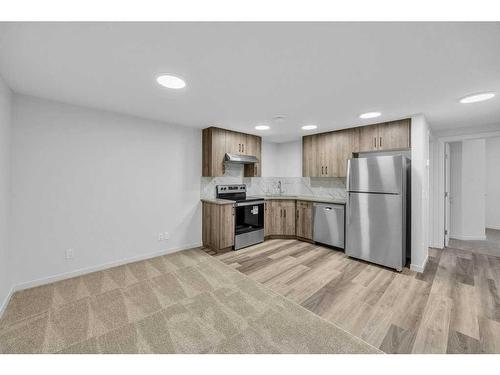 62 Sugarsnap Gardens Se, Calgary, AB - Indoor Photo Showing Kitchen With Stainless Steel Kitchen