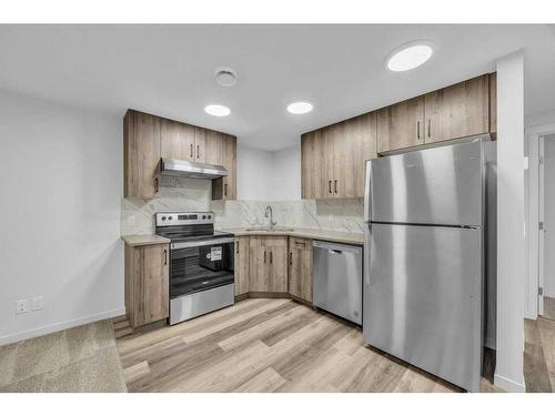 62 Sugarsnap Gardens Se, Calgary, AB - Indoor Photo Showing Kitchen With Stainless Steel Kitchen