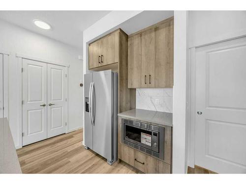 62 Sugarsnap Gardens Se, Calgary, AB - Indoor Photo Showing Kitchen