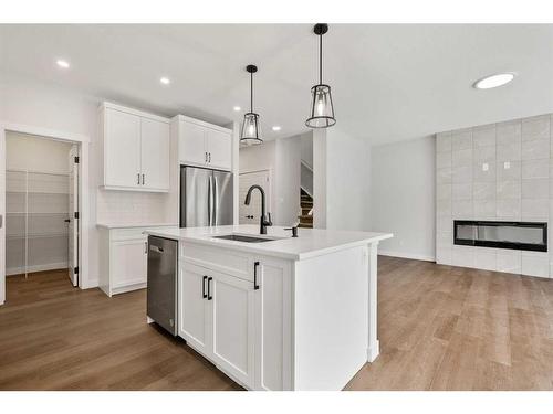 382 Rivercrest Road, Cochrane, AB - Indoor Photo Showing Kitchen With Upgraded Kitchen