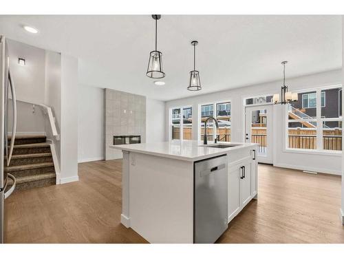 382 Rivercrest Road, Cochrane, AB - Indoor Photo Showing Kitchen With Double Sink With Upgraded Kitchen