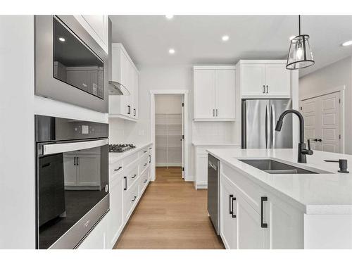 382 Rivercrest Road, Cochrane, AB - Indoor Photo Showing Kitchen With Stainless Steel Kitchen With Upgraded Kitchen