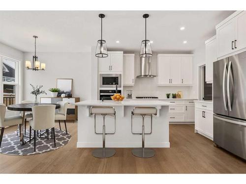 382 Rivercrest Road, Cochrane, AB - Indoor Photo Showing Kitchen With Stainless Steel Kitchen With Upgraded Kitchen