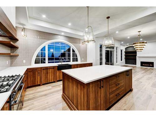 76 Aspen Ridge Square Sw, Calgary, AB - Indoor Photo Showing Kitchen With Upgraded Kitchen