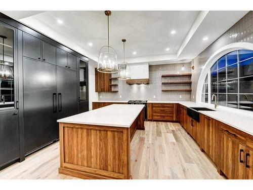 76 Aspen Ridge Square Sw, Calgary, AB - Indoor Photo Showing Kitchen With Upgraded Kitchen