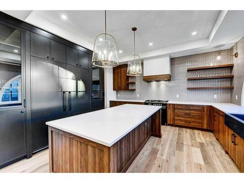 76 Aspen Ridge Square Sw, Calgary, AB - Indoor Photo Showing Kitchen With Upgraded Kitchen