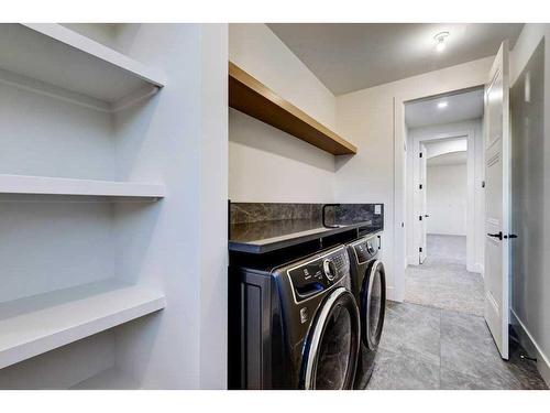 76 Aspen Ridge Square Sw, Calgary, AB - Indoor Photo Showing Laundry Room