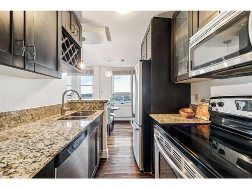 1105-733 14 Avenue Sw, Calgary, AB - Indoor Photo Showing Kitchen With Stainless Steel Kitchen With Double Sink With Upgraded Kitchen