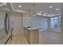 306-562 Seton Circle Se, Calgary, AB  - Indoor Photo Showing Kitchen With Upgraded Kitchen 