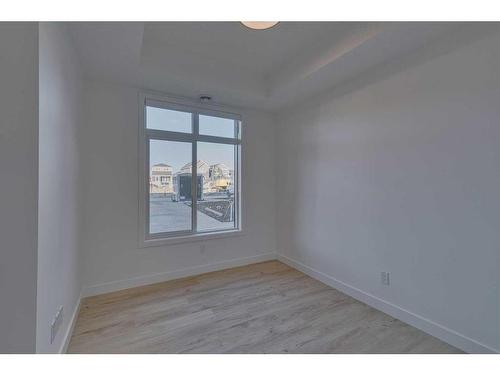 306-562 Seton Circle Se, Calgary, AB - Indoor Photo Showing Other Room