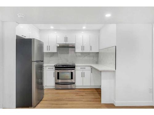 1190 Ranchlands Boulevard Nw, Calgary, AB - Indoor Photo Showing Kitchen With Upgraded Kitchen