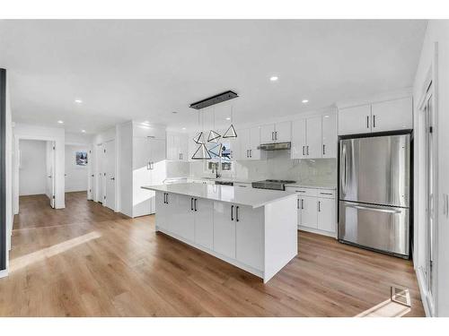 1190 Ranchlands Boulevard Nw, Calgary, AB - Indoor Photo Showing Kitchen With Upgraded Kitchen