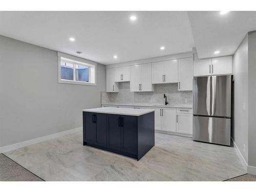 205 South Shore View, Chestermere, AB - Indoor Photo Showing Kitchen With Stainless Steel Kitchen