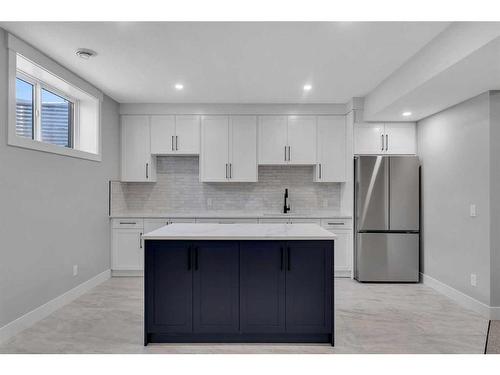 205 South Shore View, Chestermere, AB - Indoor Photo Showing Kitchen With Stainless Steel Kitchen With Upgraded Kitchen