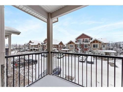 52 West Caoch Manor Sw, Calgary, AB - Outdoor With Balcony With Exterior