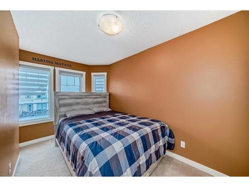 1809-2445 Kingsland Road Se, Airdrie, AB - Indoor Photo Showing Bedroom