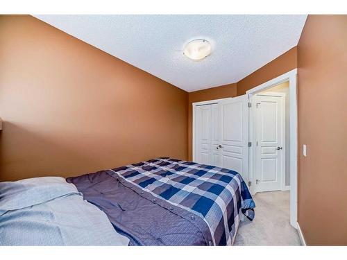 1809-2445 Kingsland Road Se, Airdrie, AB - Indoor Photo Showing Bedroom