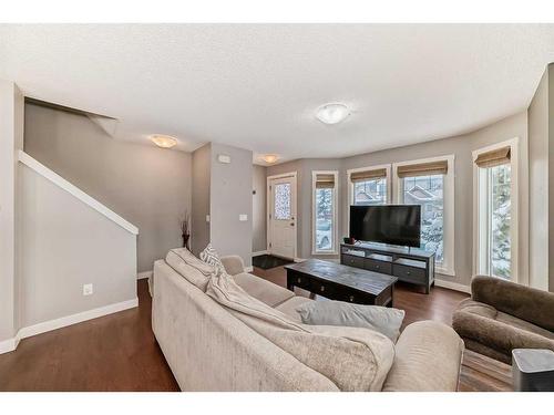 1809-2445 Kingsland Road Se, Airdrie, AB - Indoor Photo Showing Living Room