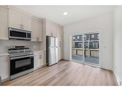 103-75 Cornerstone Row Ne, Calgary, AB - Indoor Photo Showing Kitchen