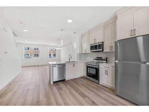 103-75 Cornerstone Row Ne, Calgary, AB - Indoor Photo Showing Kitchen With Upgraded Kitchen