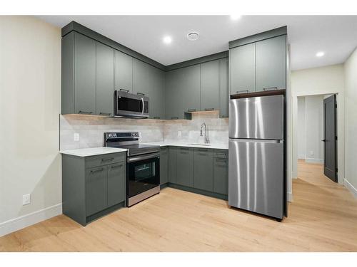 161 Heston Street Nw, Calgary, AB - Indoor Photo Showing Kitchen With Stainless Steel Kitchen