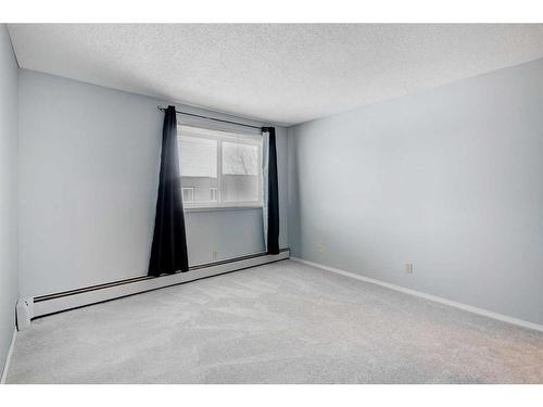 306-36 Glenbrook Crescent, Cochrane, AB - Indoor Photo Showing Other Room