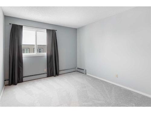 306-36 Glenbrook Crescent, Cochrane, AB - Indoor Photo Showing Other Room