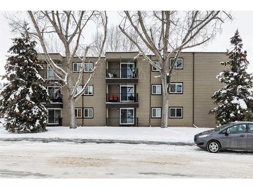 306-36 Glenbrook Crescent, Cochrane, AB - Outdoor With Facade