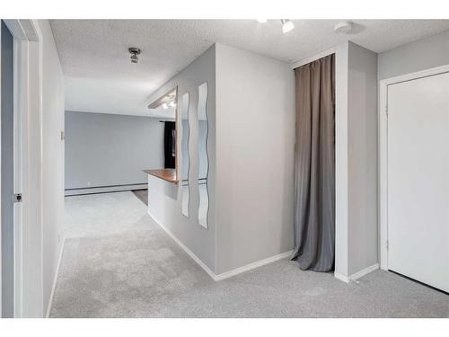 306-36 Glenbrook Crescent, Cochrane, AB - Indoor Photo Showing Other Room