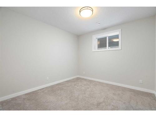 40 Willow Street, Cochrane, AB - Indoor Photo Showing Other Room