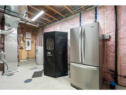 40 Willow Street, Cochrane, AB - Indoor Photo Showing Basement