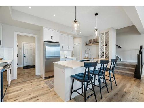 40 Willow Street, Cochrane, AB - Indoor Photo Showing Kitchen With Upgraded Kitchen