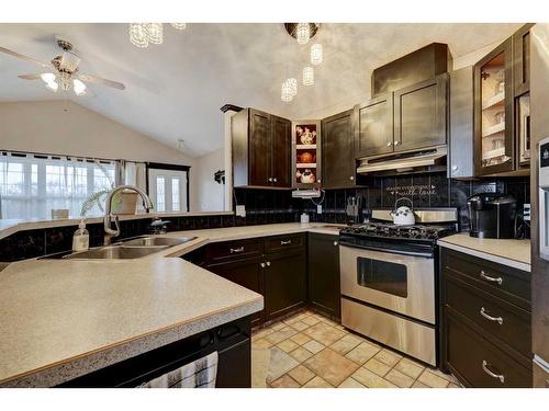 303 1 Street, Irricana, AB - Indoor Photo Showing Kitchen With Double Sink