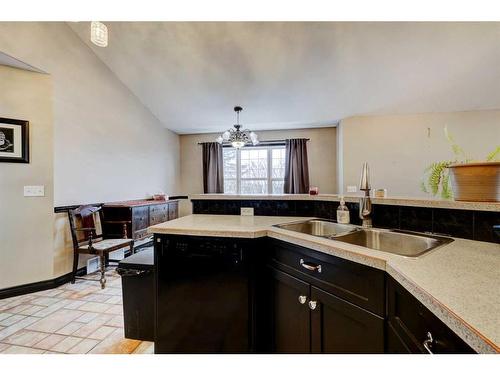 303 1 Street, Irricana, AB - Indoor Photo Showing Kitchen With Double Sink