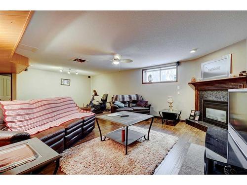 303 1 Street, Irricana, AB - Indoor With Fireplace