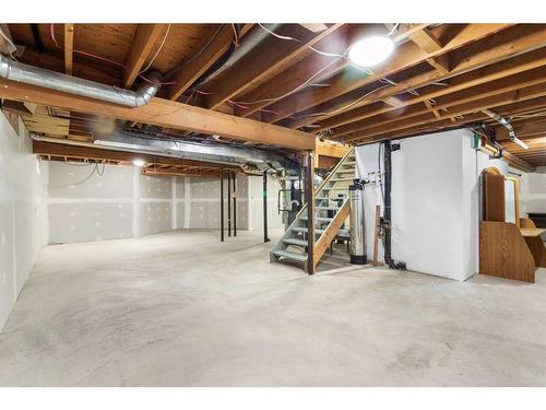 33 Shawnee View Sw, Calgary, AB - Indoor Photo Showing Basement