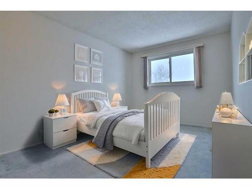 208 Edgedale Way Nw, Calgary, AB - Indoor Photo Showing Bedroom